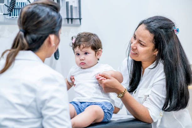 istock Baby at medical appointment 1156198972