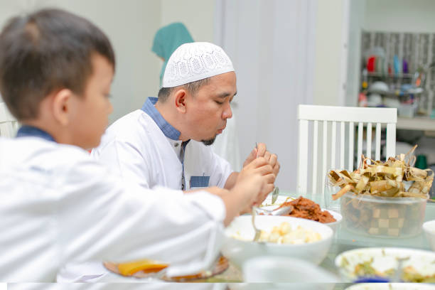 istock a family take a dinner in their house 1156201117