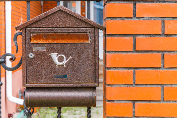 istock A beautiful mailbox hangs waiting for newspapers, parcels and letters. 1156204552