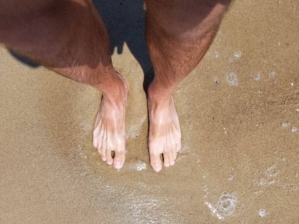 istock Walking on the sand - Stock image 1156211034