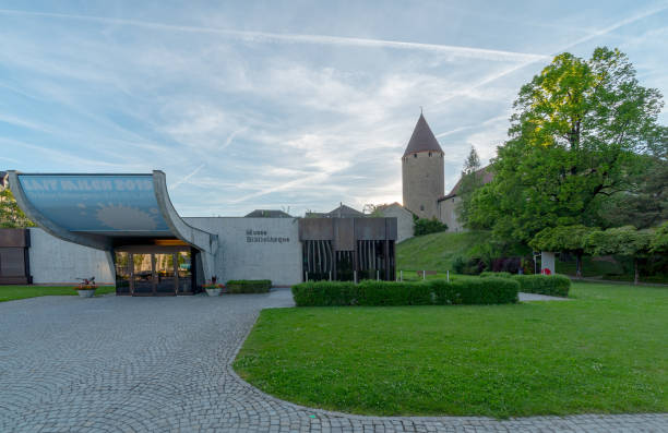 the historic landmark museum and library in the Swiss city of Bulle in the canton of Fribourg Bulle, FR / Switzerland - 1 June 2019: the historic landmark museum and library in the Swiss city of Bulle in the canton of Fribourg bulle stock pictures, royalty-free photos & images