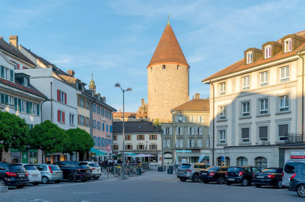 the historic city center in the Swiss village of Bulle in canton Fribourg Bulle, FR / Switzerland - 1 June 2019: the historic city center in the Swiss village of Bulle in canton Fribourg bulle stock pictures, royalty-free photos & images