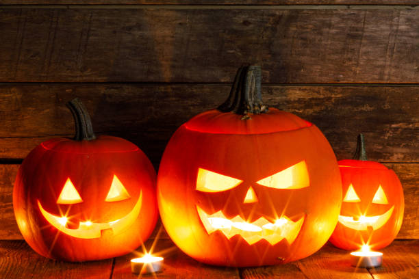 istock Halloween pumpkins and candles 1156214515