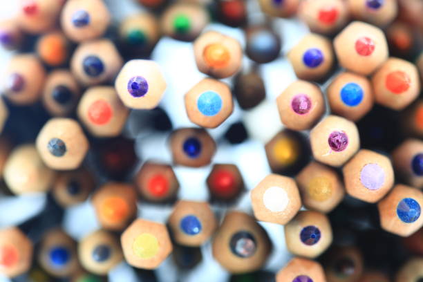 istock stacked color pencils close up shot with back light. 1156215518