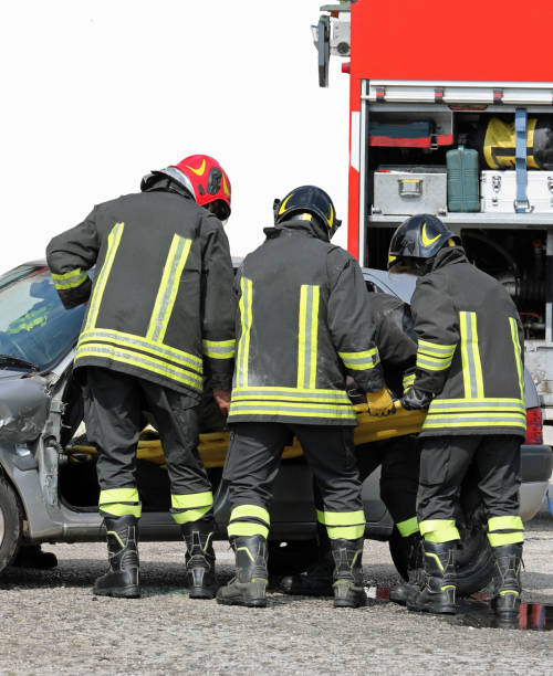 istock team of firefighters in action 1156216819