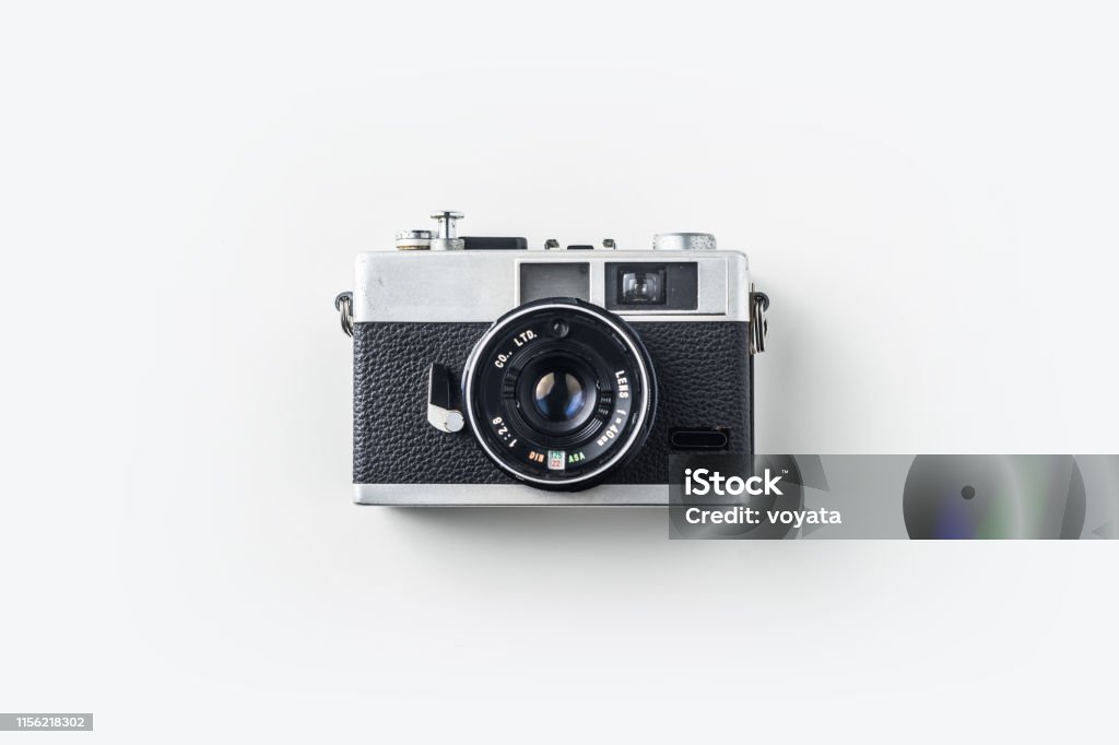 Top view of vintage cameras on white background Top view of vintage cameras on white background desk for mockup Camera - Photographic Equipment Stock Photo