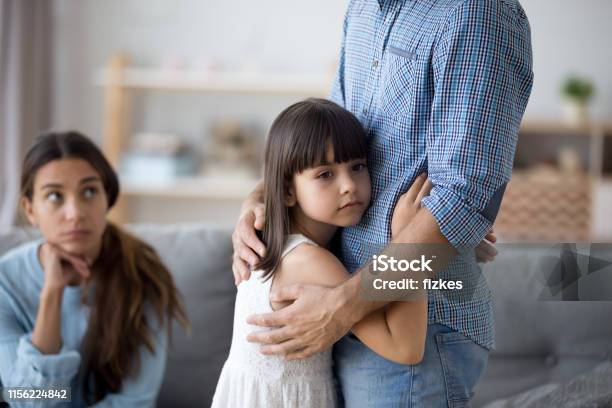 Unhappy Little Child Hug Leaving Parent Say Goodbye Stock Photo - Download Image Now