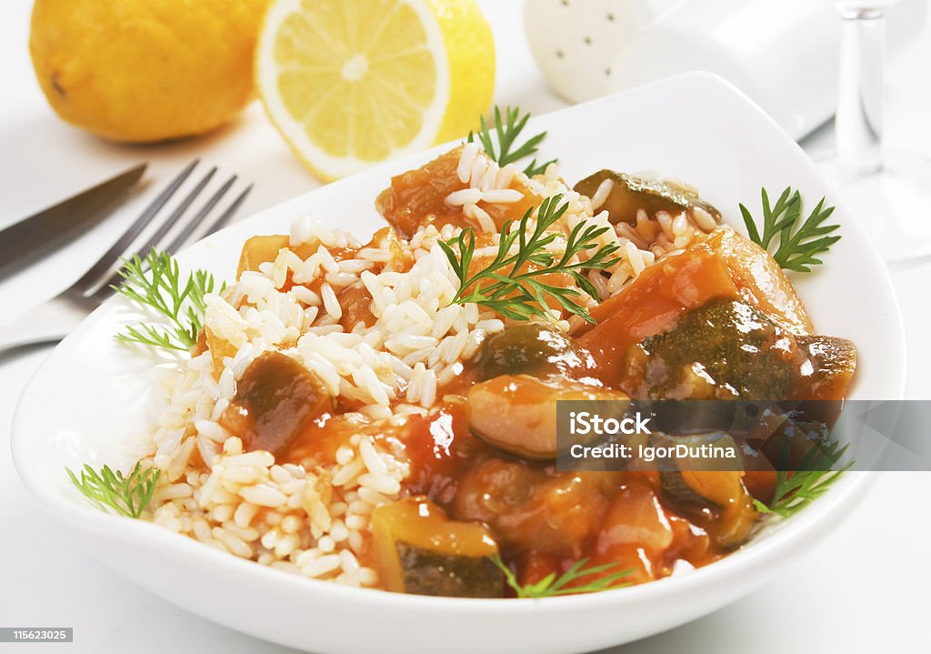 Vegetarian rice with vegetables Vegetables and rice in sauce, healthy vegetarian meal Ratatouille Stock Photo