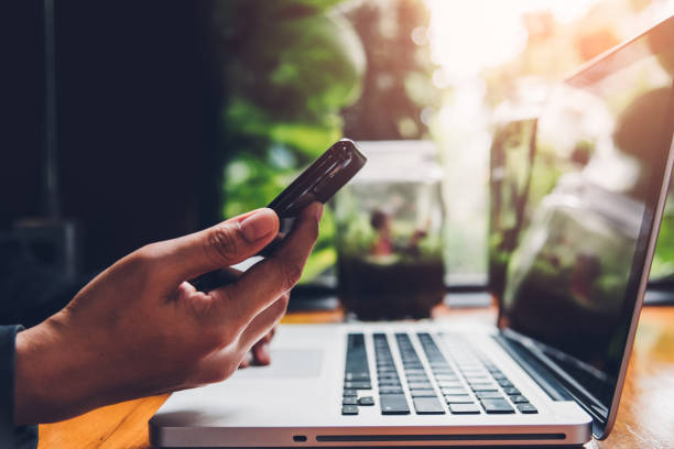 istock Young businesswoman is working on mobile smartphone 1156233449