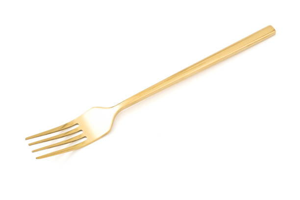 istock golden fork isolated on a white background 1156234002