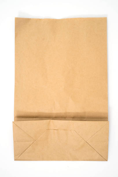 istock brown paper bag isolated on white background 1156234015
