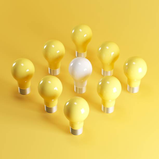 istock white light bulb among yellow light bulbs on yellow backgound. minimal idea concept. 3D Render. 1156238906