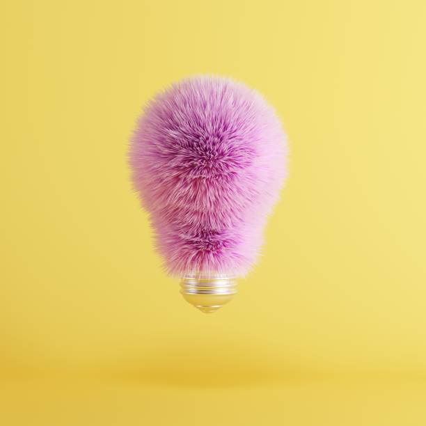 istock Pink Fur Light Bulb on floating yellow background. minimal idea creative concept. 3D Render. 1156238929