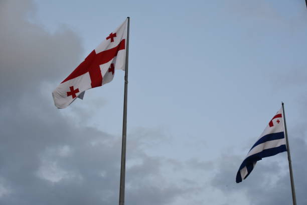 istock Flag of Georgia and Algeria 1156240621