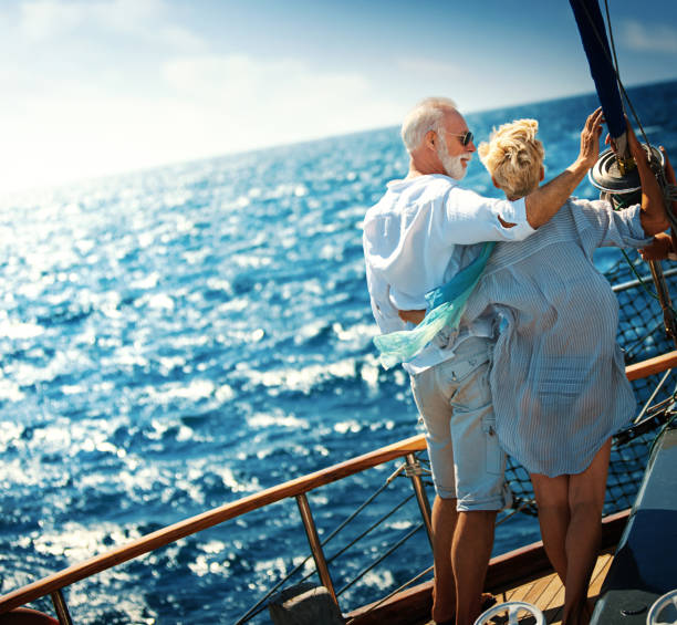 istock Senior couple on a sailing cruise. 1156247266