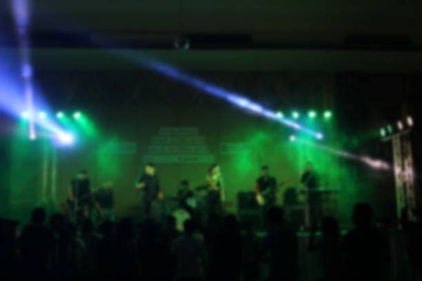 istock People in parties or celebrations blur at night. 1156248913