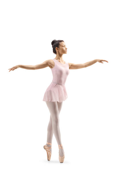 istock Young female ballet dancer dancing on tiptoes 1156249591
