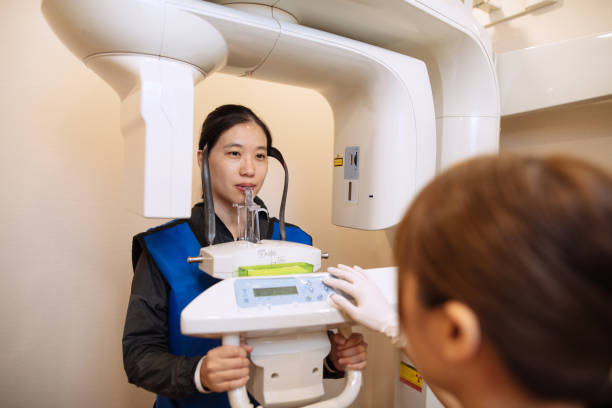istock Doing x-ray and CAT scan at dentist 1156249830