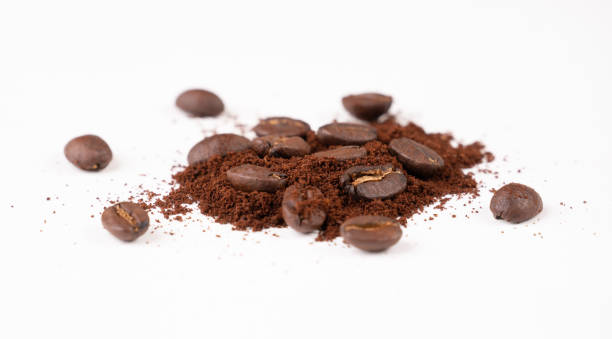 istock roasted coffee bean with powder isolated on white background 1156249891