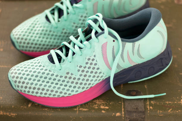 istock Female sneakers in light blue for running 1156250939