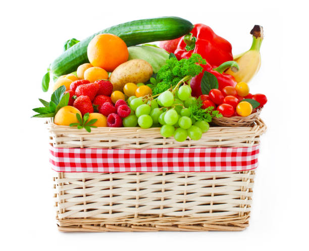 istock Various fruits and vegetables in a basket 1156252365