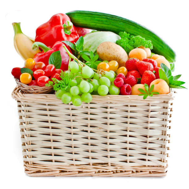 istock Various fruits and vegetables in a basket 1156252404