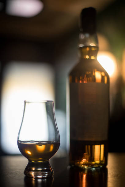 istock Glencairn whisky glass and bottle 1156253919