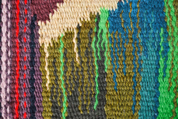 istock Colored grungy textured background or wallpaper from coarse woven multicolor and empty space. 1156257439