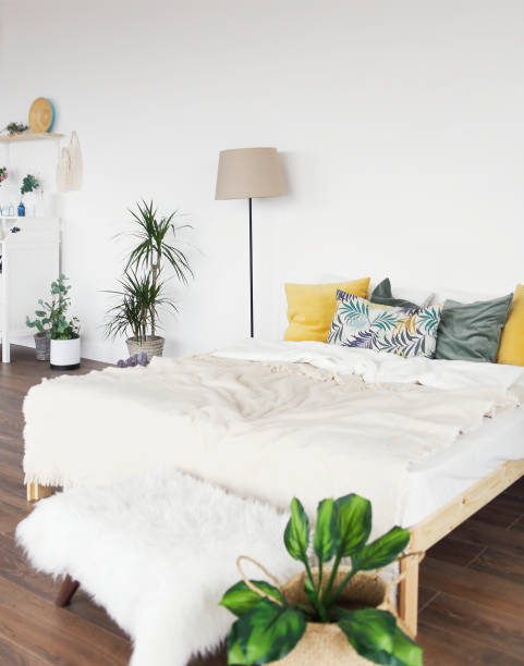 istock Bedroom with the bed and White commode on light room 1156257640