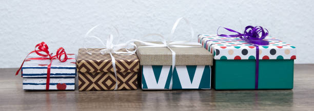 istock Festive gift boxes, gifts on a wooden table. 1156260928