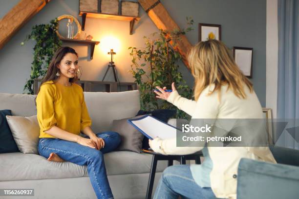 Psychologist Having Session With Her Female Patient Stock Photo - Download Image Now