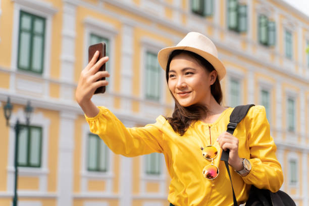 istock Happy woman take a selfie on vacation time 1156261793