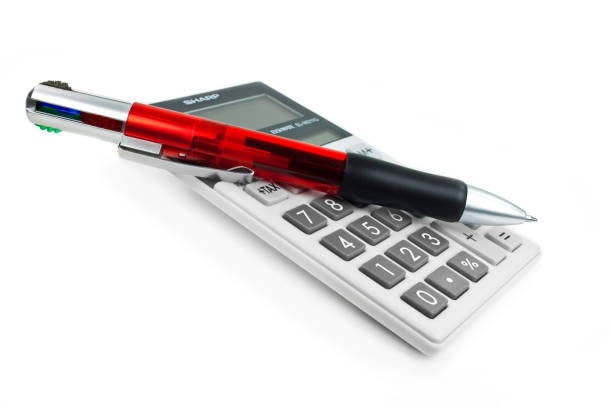 istock Finances calculator and red pen 1156263656