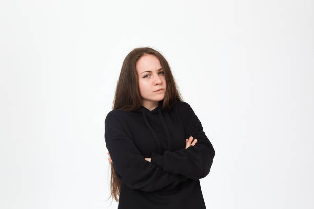 istock Upset brunette girl isolated on a white background. 1156265194