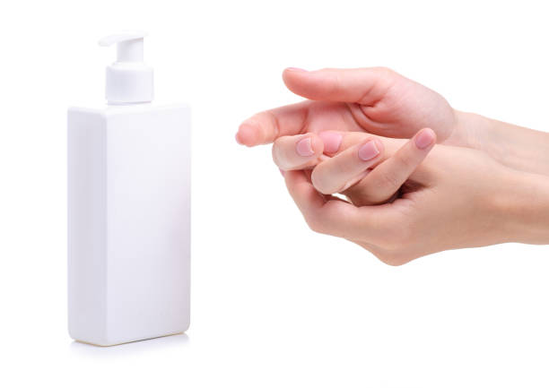 istock White bottle soap with dispenser in hand 1156266860