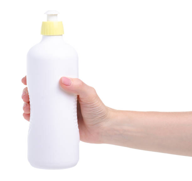 istock Detergent for utensils dishes plates in hand 1156266906
