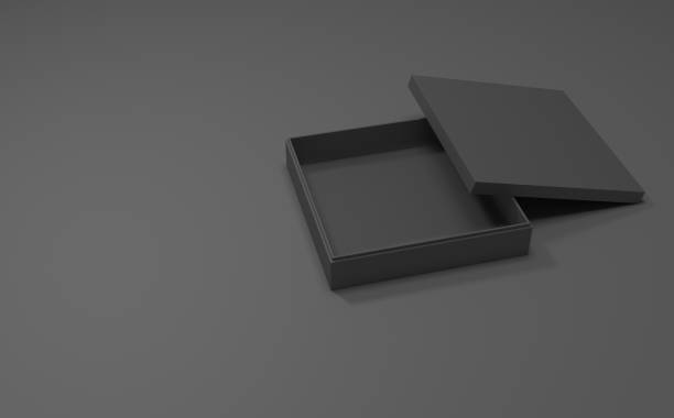 istock Elegant black box mockup on black background, realistic 3d illustration. Minimal design, luxury packaging concept with empty space nearby. 1156270477