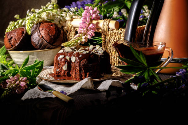 istock Chocolate muffins on the table, dark background 1156272112