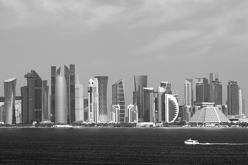 Dhow in the bay of Doha overlooking the attractive skyscrapers of the business district