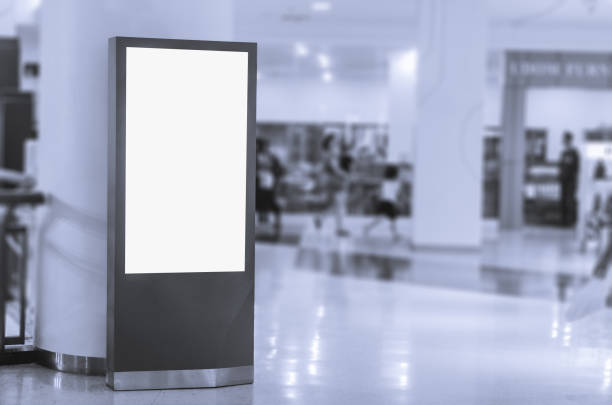 istock blank billboard white screen LED vertical advertising banner board indoor in subway station ad interior public hall. 1156273820