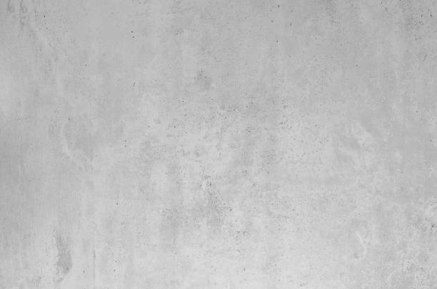 istock gray concrete background texture clean stucco fine grain cement wall clear and smooth white polished grunge interior indoor. 1156273959