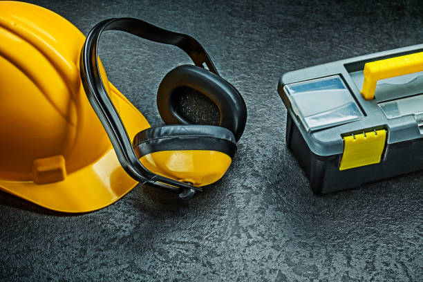 istock helmet earphones and tool box 1156275951