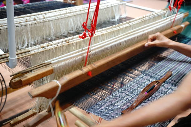 istock Close up Weavers are weaving with a loom 1156277055