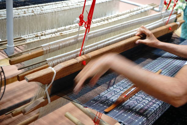 istock Traditional way at manual loom 1156277102