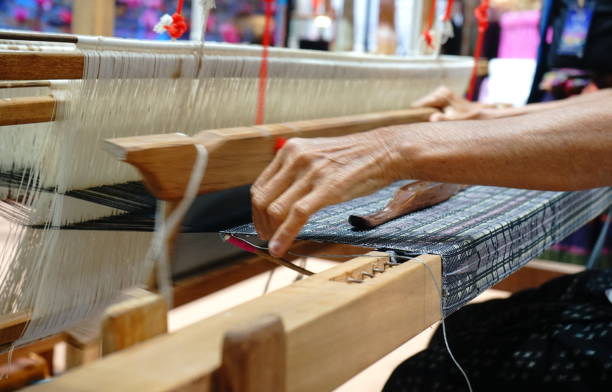 istock Traditional way at manual loom 1156277290