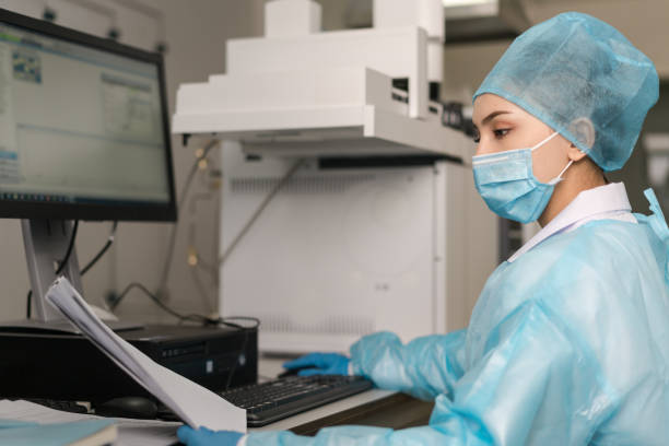 istock Young female scientist working in the laboratory 1156277878