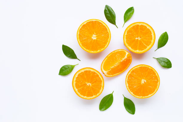 istock Fresh orange citrus fruit with leaves isolated on white background. 1156281421