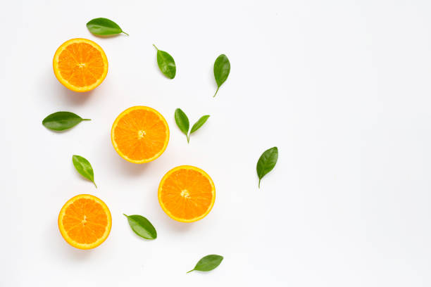 istock Fresh orange citrus fruit with leaves isolated on white background. 1156281580