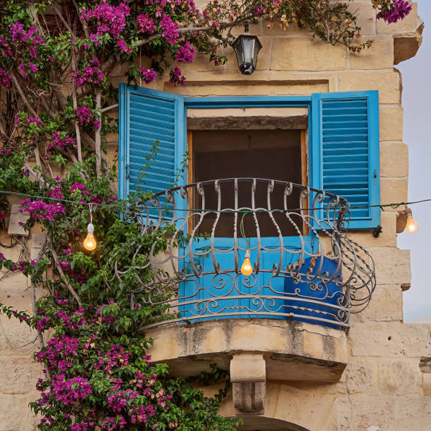 istock Tiny cozy vintage balcony with shutters decorated with elimination 1156283084