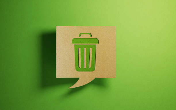 istock Chat Bubble Made of Recycled Paper on Green Background 1156286377